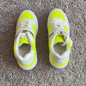 Brand new! Vince Camuto casual sneaker in bright yellow and white trim.